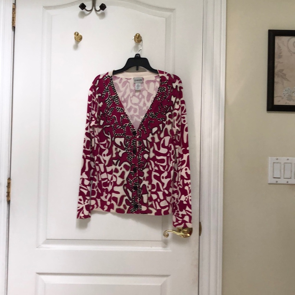 Fancy sweater with sequence and bead  detailing.